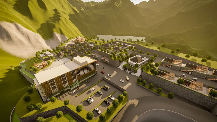 Aerial view of the hotel block, car park and cottages on the slope